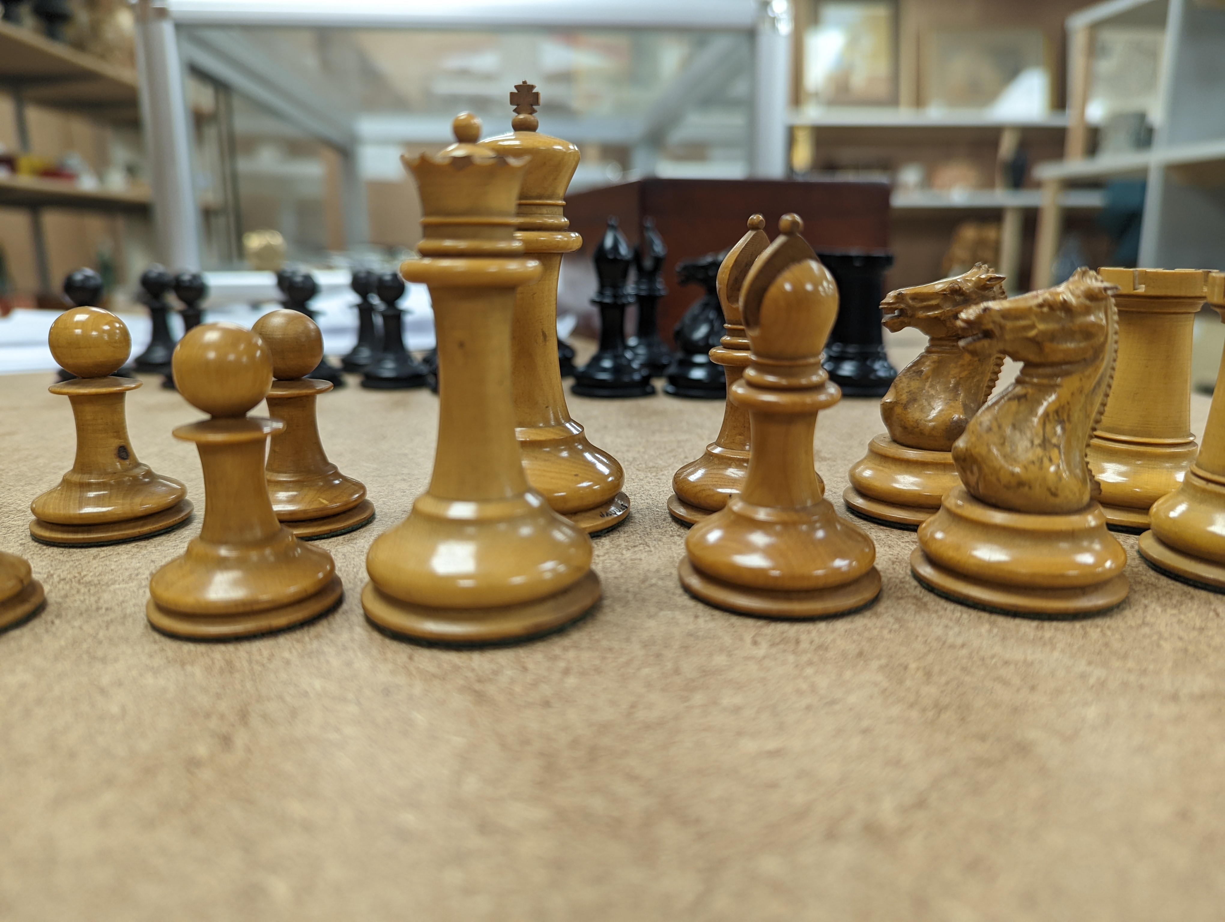 A boxed Jaques Staunton boxwood and ebony chess set, White king stamped Jaques London, 8.5cm high
